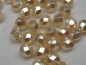 Preview: 4mm 50 feuerpol Glasperlen Coated Champagne