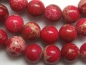 Preview: 6mm 10 St Howlith Perlen rot rund poliert