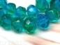 Preview: 4x Rondelle Green Capri blue Glasperlen 6x8mm