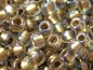 Preview: 6/0 10g TOHO Rocailles Inside Crystal Gold Lined