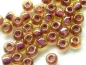 Preview: 6/0 10g TOHO Rocailles Light Topaz Pink Lined