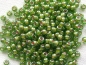 Preview: 11/0 Rocailles TOHO Peridot Opaque White Lined 10g