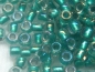 Preview: 11/0 Rocailles TOHO Rainbow Crystal Teal Lined 10g